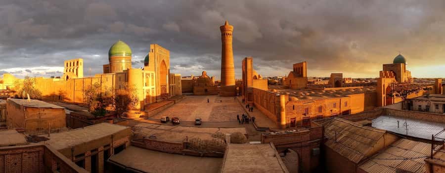 A Group Walking Tour Of Old Town - The Citadel Ark and Bukhara’s grand scale