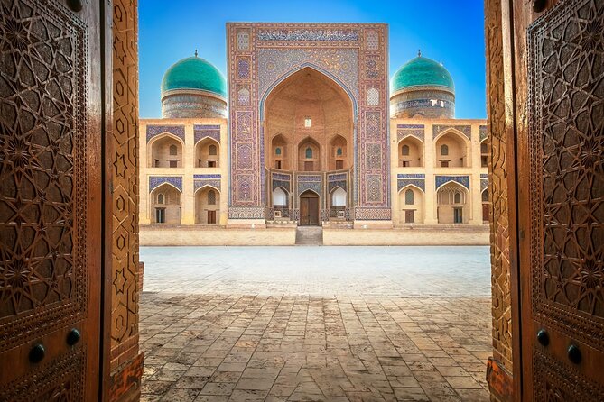 Bukhara Full Day Old City Private Tour - Starting beneath the Kalon Minaret