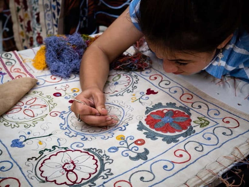 Legends and Crafts: Suzani Masterclass & Cultural Immersion - Sitting down for the Suzani masterclass