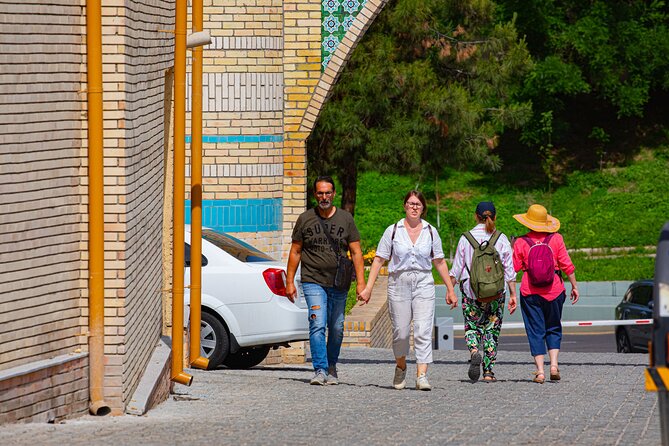 Tashkent Walking & Food Tour: Highlights + Local Flavors - Riding through Tashkent’s artistic metro