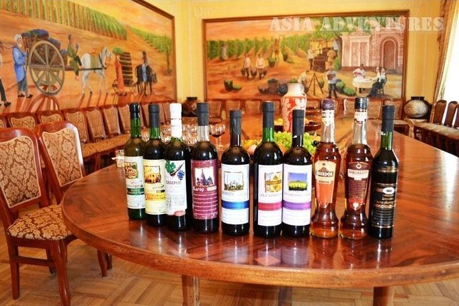 Wine Tasting Tour in Samarkand - The tasting table: wines, cognac, and sweet pours